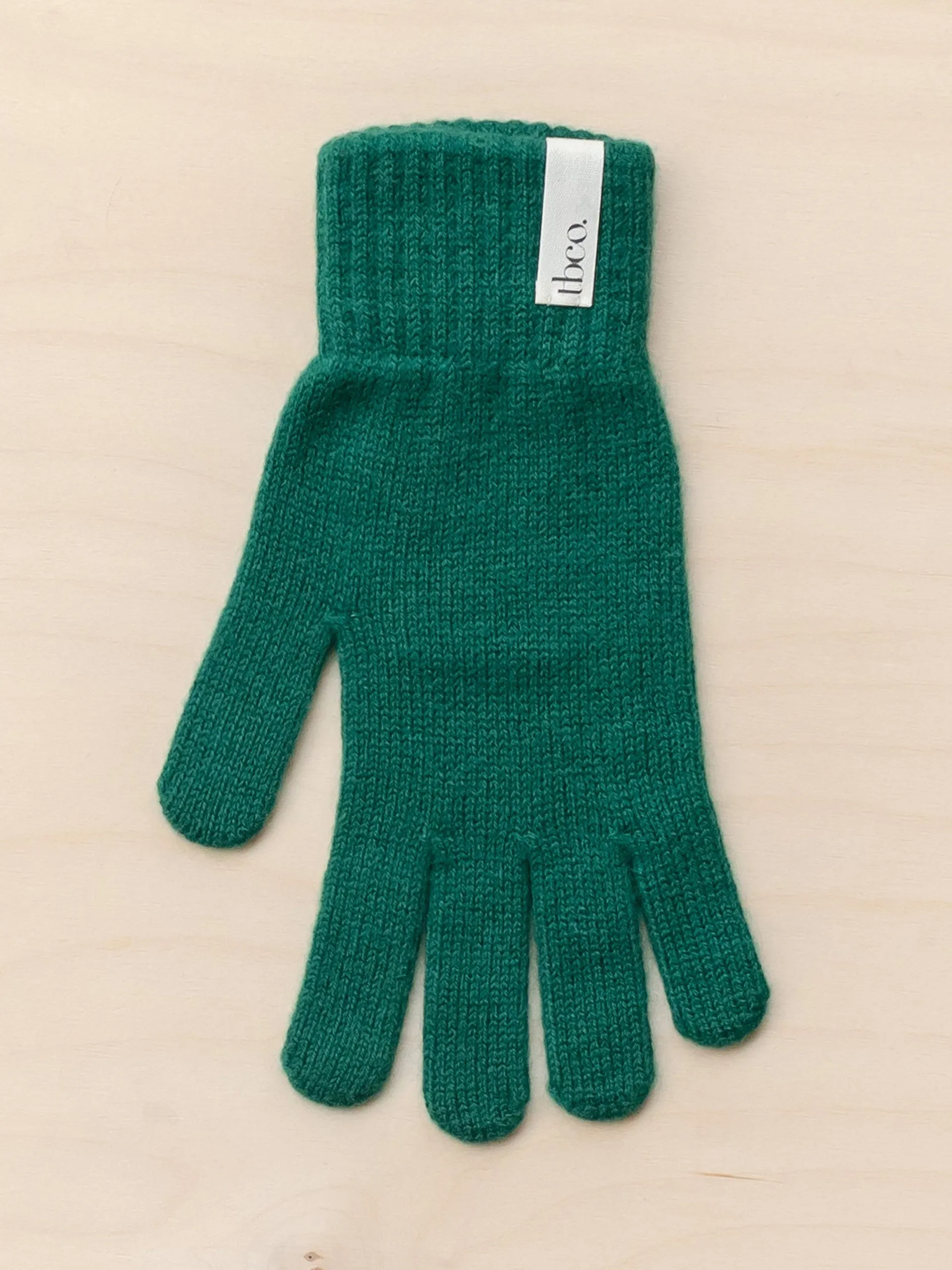 Cashmere and merino gloves in forest